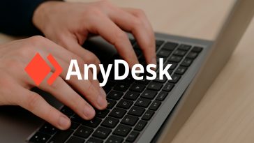 imagen generada por IA donde se ve un teclado de ordenador de fondo y el logo de AnyDesk superpuesto y centrado